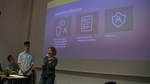 PosteHack al Talent Garden Poste Italiane di Roma: ecco le proposte innovative per buoni e libretti postali. La “Evo App” si è aggiudicata la quinta edizione. PosteHack al Talent Garden Poste Italiane di Roma: ecco le proposte innovative per buoni e libretti postali. La “Evo App” si è aggiudicata la quinta edizione.