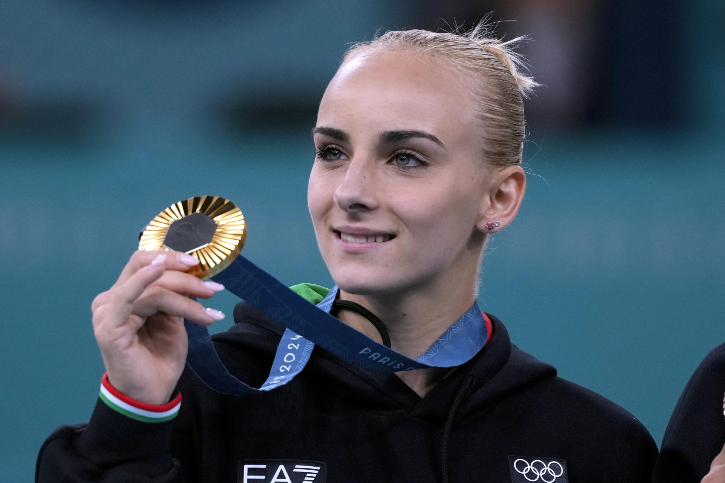 https://www.affaritaliani.it/static/upl2024/alic/alice-d-amato-olimpiadi-parigi-2024-medaglia-oro-ginnastica--5-1.jpg