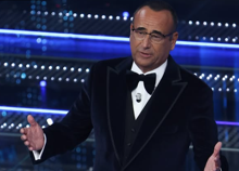 Sanremo 2026, sfilza di "no" per Carlo Conti: da Tiziano Ferro ad Annalisa, il conduttore allora aumenta il numero dei big Sanremo 2026, sfilza di "no" per Carlo Conti: da Tiziano Ferro ad Annalisa, il conduttore allora aumenta il numero dei big